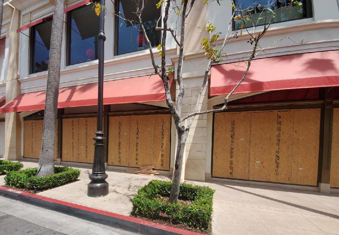 The Domain storefronts boarded up after reports of looting in